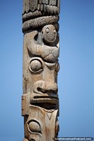 Wooden totem pole with faces dedicated to writer Marcos Sastre (1808-1887), Punta del Este. Uruguay, South America.