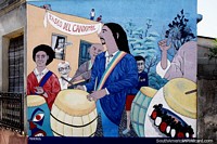 Larger version of Paseo del Candombe, fantastic mural of musicians playing drums in the street in Rocha.
