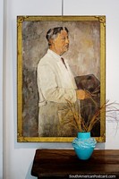 Larger version of Painting of an artist dressed in white, a ceramic vase, fine arts museum, Treinta y Tres.