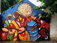 Dancers, musicians and magicians, carnival time, a street mural in Durazno. Uruguay, South America.