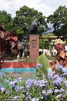Plaza Bolivar with monument, gardens and fountain in Trujillo.