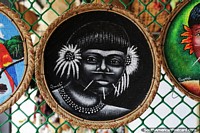 Woman with flowers in her hair, black and white painting of the Amazon in Puerto Ayacucho.