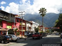 Hotels, street and green hills in Merida. Venezuela, South America.