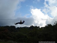 Flying horizontal on the trapeze at the botanical gardens in Merida. Venezuela, South America.
