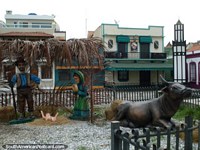 Versão maior do Natal em Porto Cabello, a aldeia com pessoas e animais.