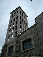 Larger version of Church tower of stone, bird overhead, Puerto Cabello, Iglesia Catedral San Jose.