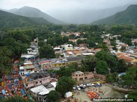 Venezuela Photo - Puerto Colombia township and surrounding mountains view from above.