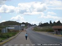 The short walk up the road between the Venezuelan and Brazilian border controls in Santa Elena. Venezuela, South America.