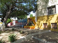Plaza Antonio Jose de Sucre in Maracaibo with wall mural in red, blue, green and yellow. Venezuela, South America.