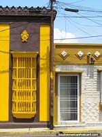 Nice colors side by side, historical houses in Maracaibo. Venezuela, South America.