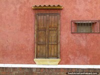 Nice wooden door of a house in the Zona Colonial, Carora. Venezuela, South America.