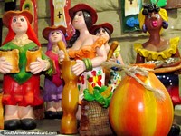 Colorful female figures for shelves in El Tintorero. Venezuela, South America.