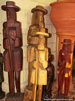 Bearded old man wooden figures with hat and cane in El Tintorero.