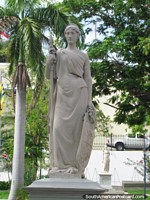 Nueva Granada, white statue of a woman in Plaza Bolivar in Ciudad Bolivar. Venezuela, South America.
