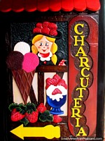 A Charcuteria is a butcher but the sign has icecreams and strawberries, Colonia Tovar.
