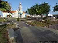 The cute white and blue church at Plaza Bolivar in Adicora. Venezuela, South America.
