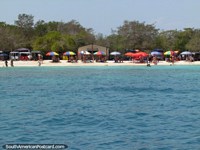 Umbrellas on the islands and beaches at Morrocoy National Park. Venezuela, South America.