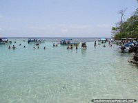 Larger version of People swim in the shallow waters around Cajo Los Juanes, Morrocoy National Park.