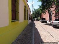 A cobblestone street and historic buildings in Barquisimeto.