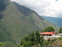 A house on the edge of a huge valley between Barinitas and Santo Domingo. Venezuela, South America.