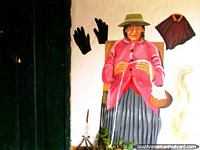 Mujeres Tejedoras del Paramo, mural of an older woman in pink in Mucuchies. Venezuela, South America.