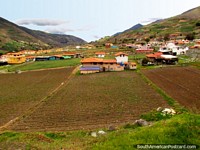 Houses, hills and farmland around La Toma near Mucuchies. Venezuela, South America.