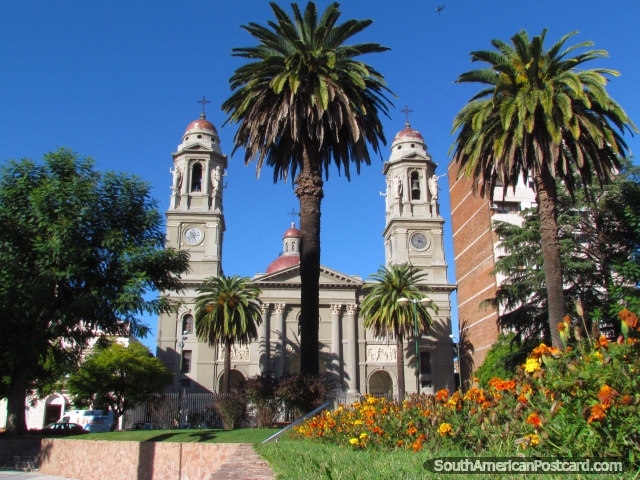 Cathedral, palms and flower gardens at the plaza in Mercedes. (640x480px). Uruguay, South America.