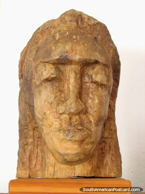 Indigenous head made of wood at museum Museo Indigena in Colonia. (480x640px). Uruguay, South America.
