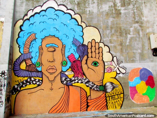Arte de graffiti vistoso en Montevideo, pelo azul, un ojo, ojo en palma de mano. (640x480px). Uruguay, Sudamerica.