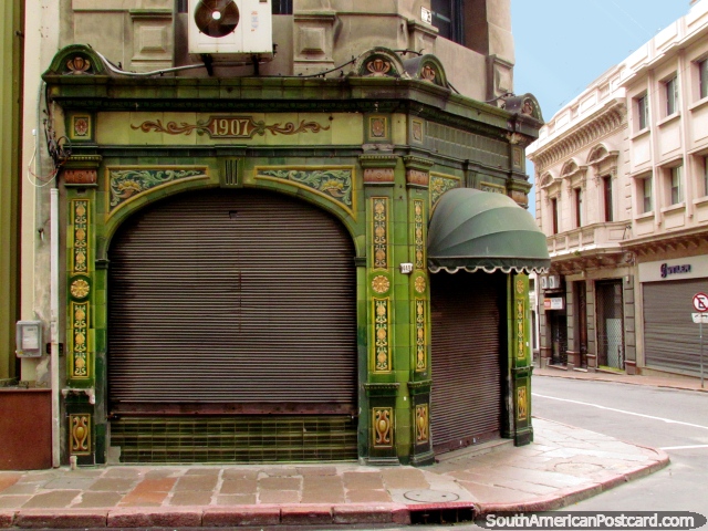 Old building in Montevideo from 1907 with green tiled facade. (640x480px). Uruguay, South America.
