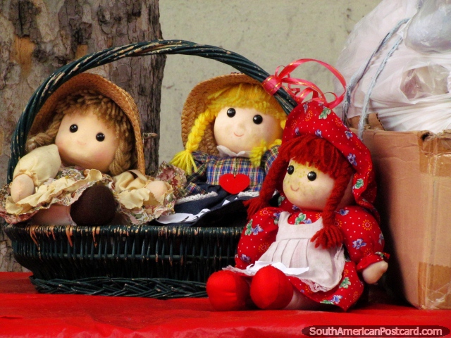 3 cute dolls at La Feria Tristan Narvaja markets in Montevideo. (640x480px). Uruguay, South America.