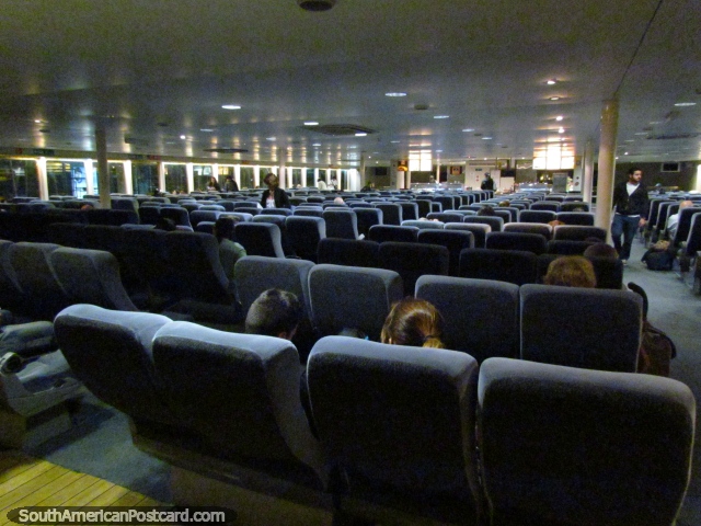 The main passenger lounge with nice soft seats on the Buquebus ferry. (640x480px). Uruguay, South America.