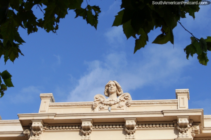Face of a woman as part of the facade of the historic theatre in Fray Bentos. (720x480px). Uruguay, South America.