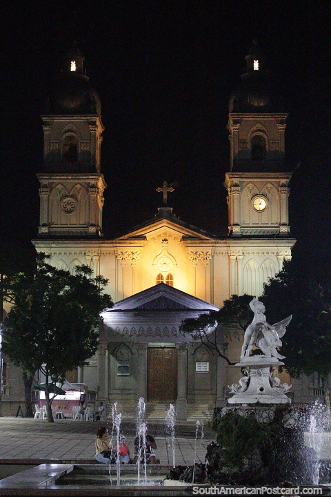 Iglesia Nuestra Seora del Carmen en la noche en Salto con fuente de primer plano. (480x720px). Uruguay, Sudamerica.