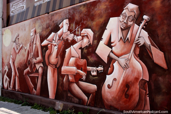 Cello, guitar, violin, saxophone and trumpet, musicians play, street art in Mercedes. (720x480px). Uruguay, South America.