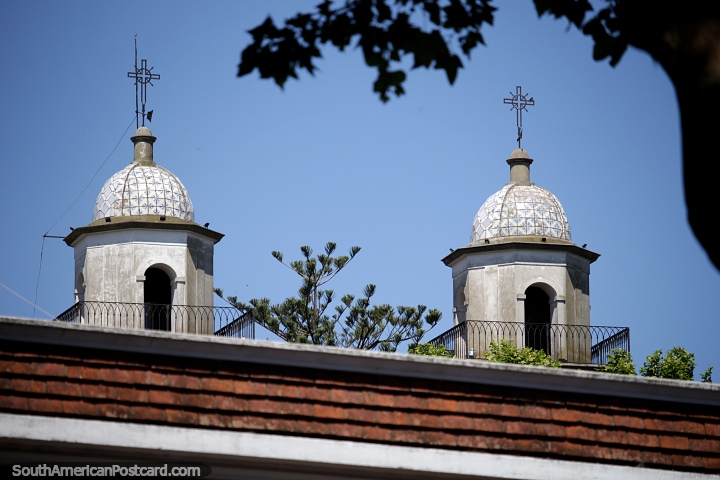 Balconies, lookout towers and domes of the church in Colonia, view from the distance. (720x480px). Uruguay, South America.