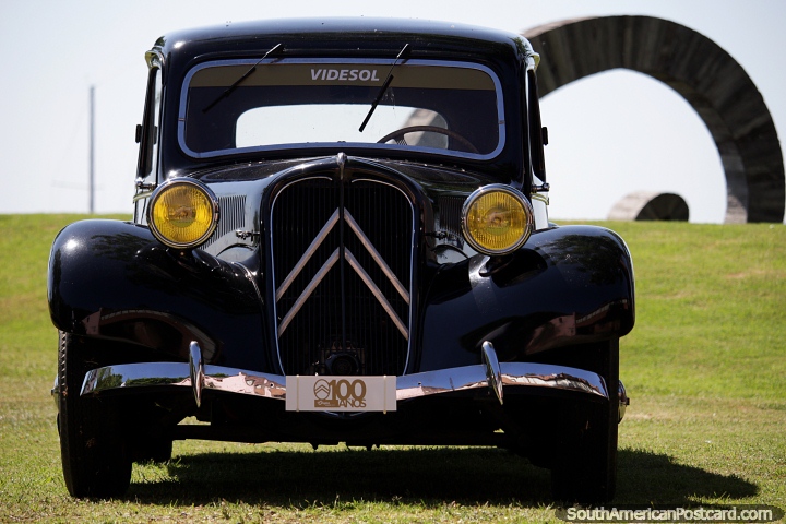 Classic black vintage car in top condition on the grass lawns of the cultural center in Colonia. (720x480px). Uruguay, South America.