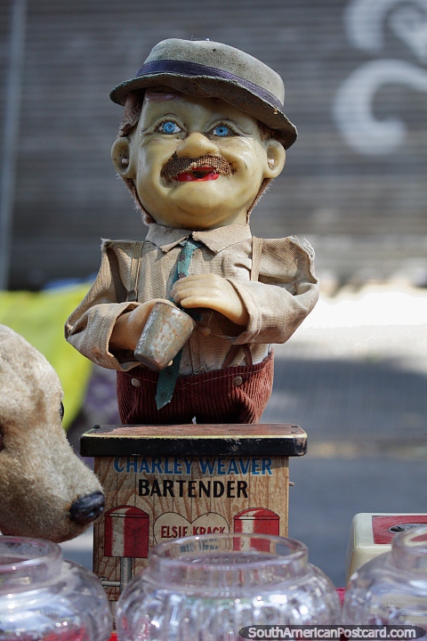 Charley Weaver the bartender, an antique figure with clothes at La Feria Tristan Narvaja market, Montevideo. (480x720px). Uruguay, South America.
