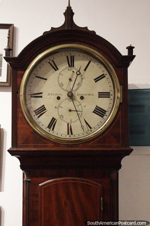 Bryson Edinburgh antique stand-up clock on display at Mazzoni Museum in Maldonado. (480x720px). Uruguay, South America.