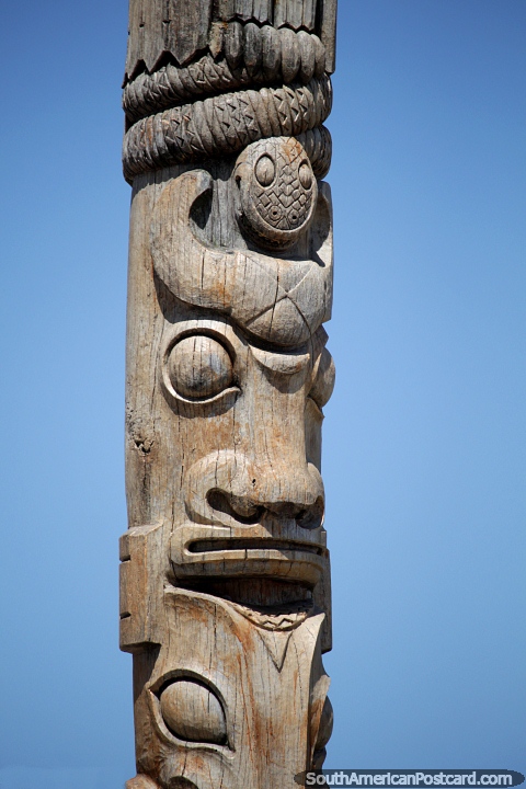 Wooden totem pole with faces dedicated to writer Marcos Sastre (1808-1887), Punta del Este. (480x720px). Uruguay, South America.