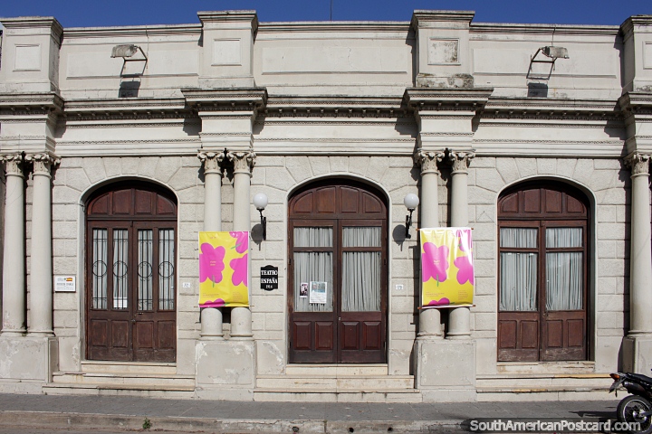 Theater in Melo - Teatro Espana (1914) beside Plaza Independencia, with columns and arched doors. (720x480px). Uruguay, South America.