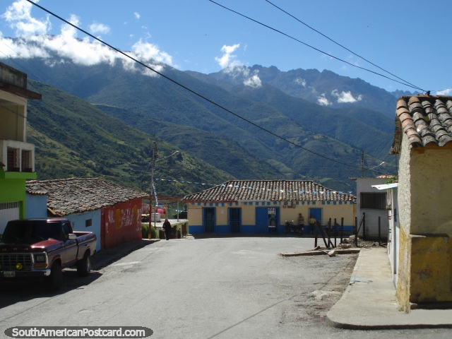Colorful buildings of blue, red and green and amazing mountain backdrops in Merida's highlands. (640x480px). Venezuela, South America.