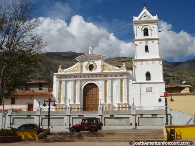 White and gold church with single bell and clock tower in Mucuchies out of Merida. (640x480px). Venezuela, South America.