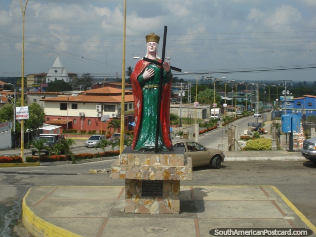 Monument of a green and red virgen Santa Elena in Obispo Ramos de Lora. (640x480px). Venezuela, South America.