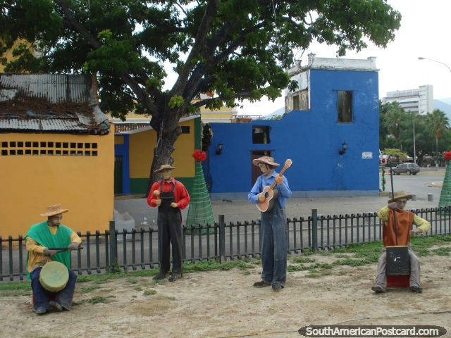 The band plays on, Christmas figures in Puerto Cabello. (640x480px). Venezuela, South America.