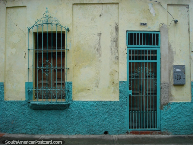 Teal and cream colored house front in Puerto Cabello with lots of character. (640x480px). Venezuela, South America.