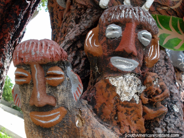 Carvings of voodoo men in a tree in Pampatar, Isla Margarita. (640x480px). Venezuela, South America.