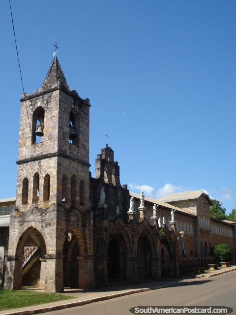 The church Iglesia Santa Elena is made of stone and has archways and statues. (480x640px). Venezuela, South America.