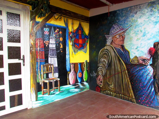 Grandmother weaves mural in El Tintorero. (640x480px). Venezuela, South America.
