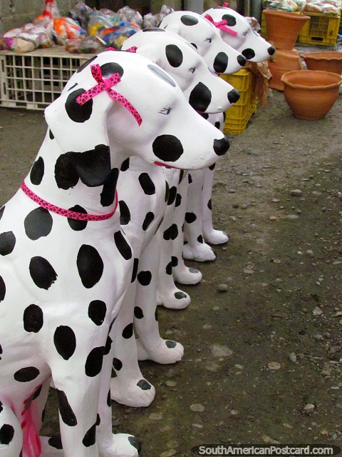 4 ceramic black spotted dogs in a row in Quibor. (480x640px). Venezuela, South America.